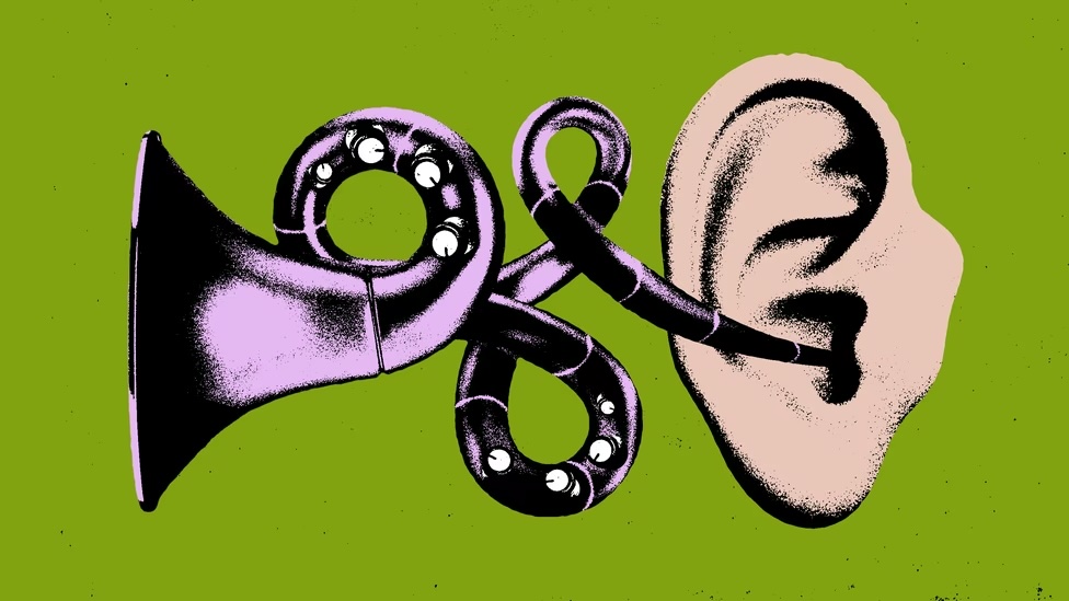 fantastical hearing device into ear