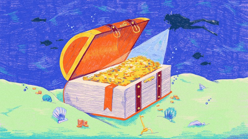 A diver finding treasure underwater