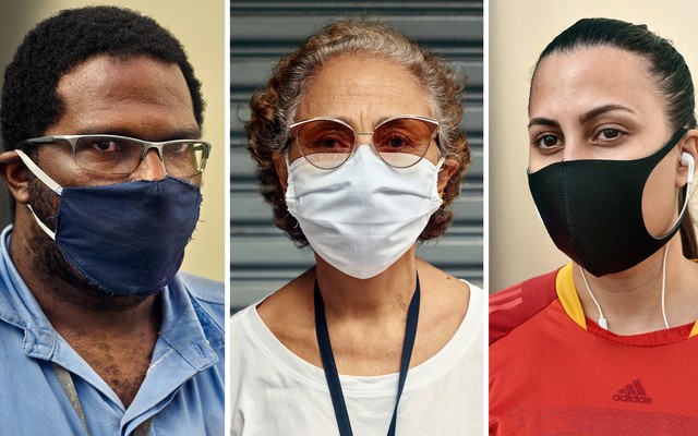 Three people wearing cloth masks