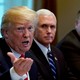 Vice President Mike Pence and Secretary of State Mike Pompeo listen as President Trump speaks during a meeting.