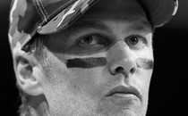 A black-and-white photo of Tom Brady