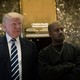 Donald Trump and Kanye West stand together in the lobby at Trump Tower, December 13, 2016 in New York City.