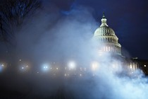 Photo of the U.S. Capitol on a foggy night