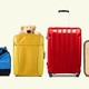 Four different suitcases, one with a stuffed animal poking out