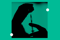 Vaccine vial being drawn into syringe