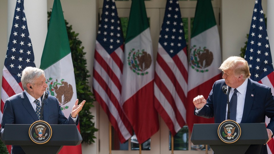 Donald Trump and Mexican President Andres Manuel Lopez Obrador speak at a joint press conference in the Rose Garden of the White House in July 2020.