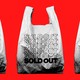 A line of plastic bags with "sold out" printed on them