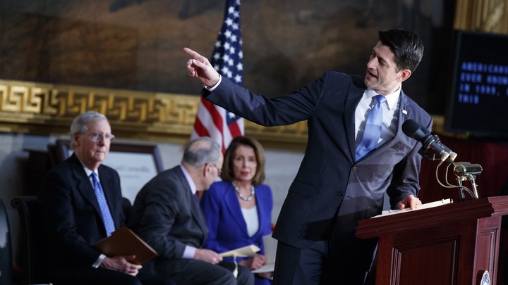 Paul Ryan speaks in front of Mitch McConnell, Chuck Schumer, and Nancy Pelosi on Capitol Hill.