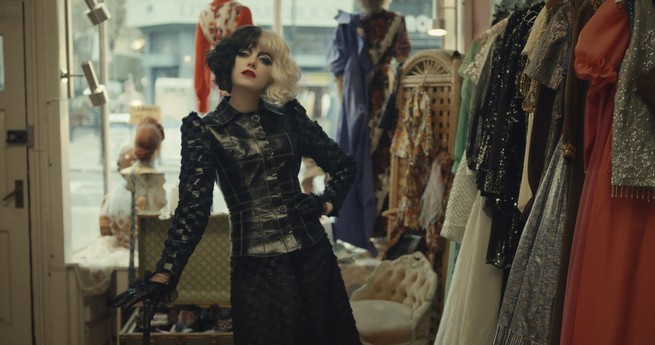 Emma Stone's Cruella in a clothing store
