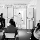 A nurse calls on patients waiting for the AstraZeneca COVID-19 vaccine at the Museum of Science and Technology in Milan, March 22.
