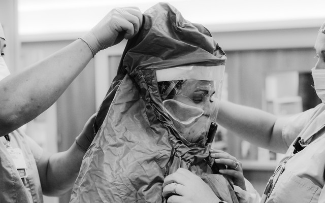 An Arkansas nurse prepares to treat a COVID-19 patient.