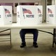 A man at a voting station