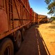 A trackless "road train" drives through the Australian outback.