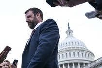 Markwayne Mullin in front of the Capitol building surrounding by reporters