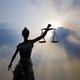 A statue of "Lady Justice" holding the scales of justice