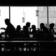 Silhouettes of people sitting in a restaurant