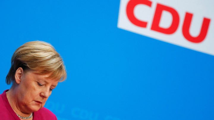 Angela Merkel attends a news conference after learning the results of the election in Hesse, Germany.