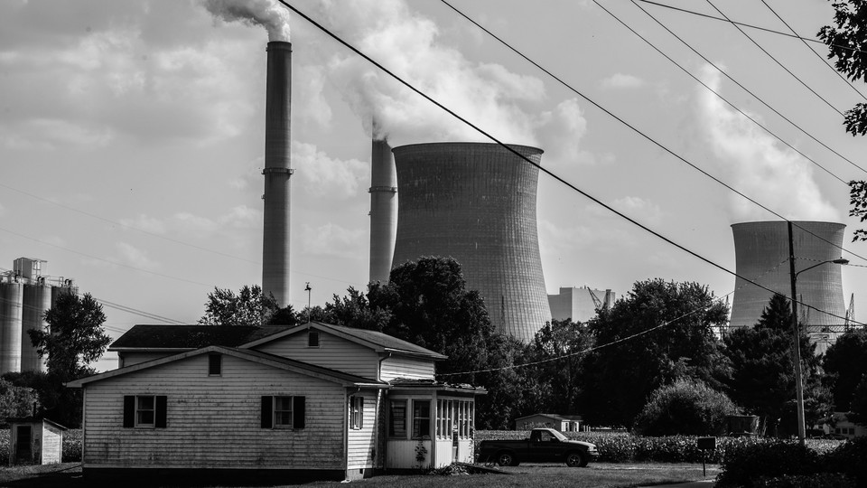 A house is seen near the massive Gavin Power Plant on September 11, 2019 in Cheshire, Ohio.