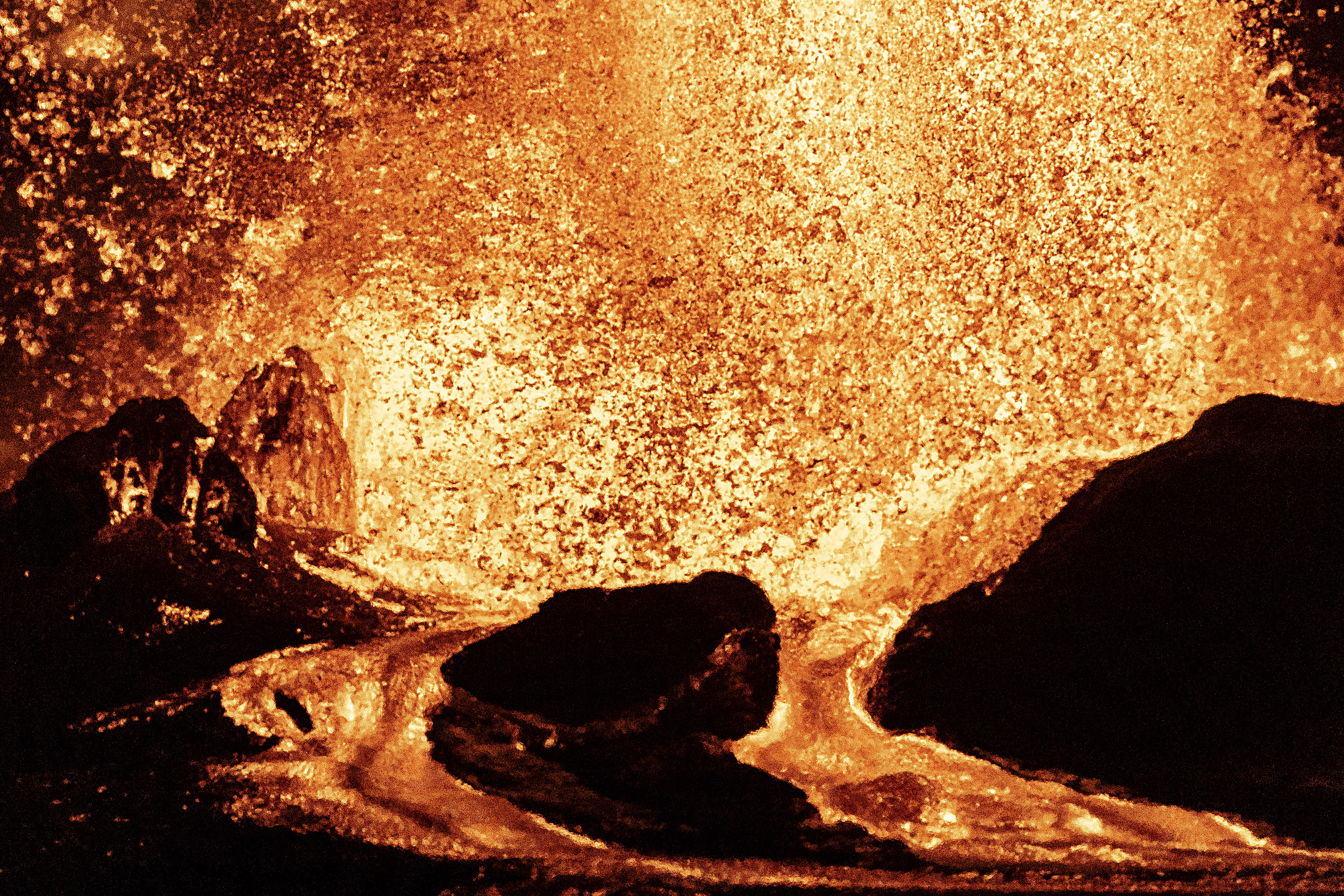 A tight view of a fountain of lava erupting
