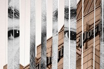 A collage of cut-out strips of Jeff Bezos interspersed with the Washington Post building