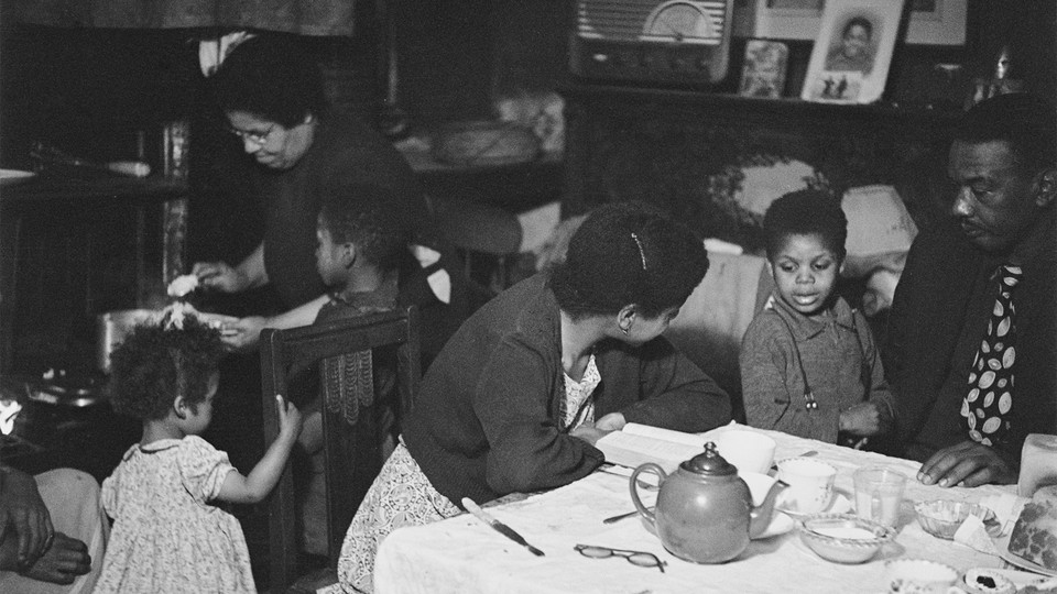 A picture of a family at dinner