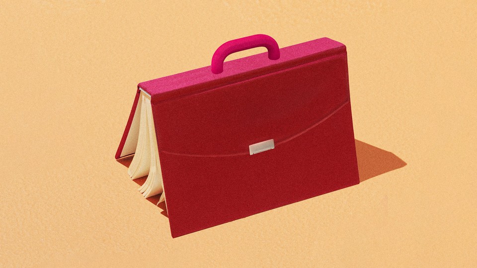 a pink briefcase made out of a book