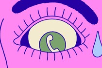 A scared-looking eye with a phone in the iris