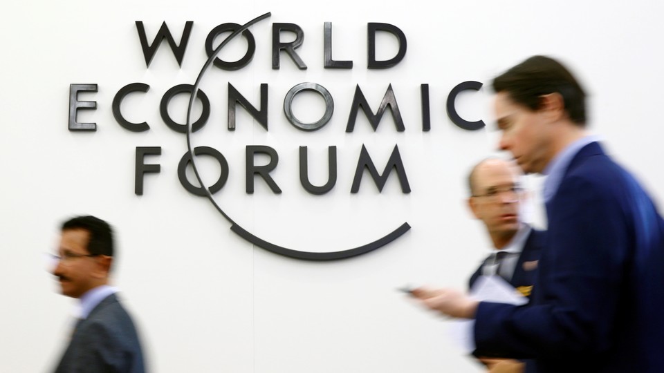 Attendees are seen during the World Economic Forum in Davos, Switzerland, on January 22, 2019.
