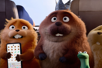 Three animated beavers and one reptile in a car. One of the beavers holds a phone, and the other has a crown; both look concerned.