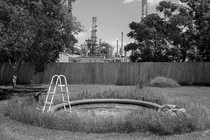 A Valero refinery behind the backyard of a house in Chalmette, Louisiana