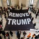 Protesters call for President Trump to be removed from office.