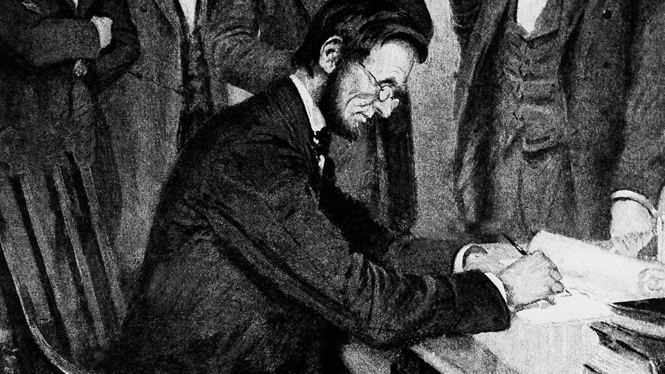 President Lincoln signs the Emancipation Proclamation