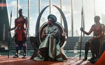 Angela Bassett as Queen Ramonda, sitting on a throne in "Black Panther: Wakanda Forever"