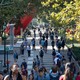 Students walking on a university sidewalk