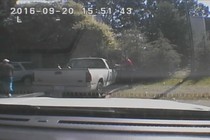 Keith Scott looks over to police with hands by his sides a second before he was shot four times by Charlotte police.