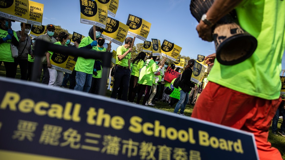 Supporters of the San Francisco School Board recall gather at Carl Larsen Park during a rally in the Sunset District of San Francisco.