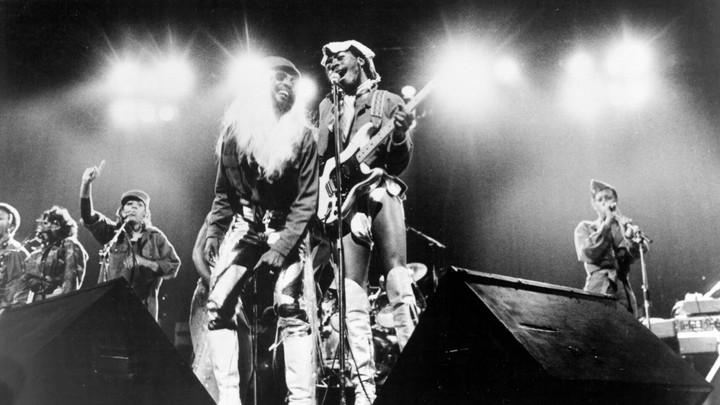 George Clinton and Garry Shider of the funk band Parliament-Funkadelic perform onstage circa 1977.