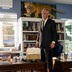 Picture of Robert F. Kennedy Jr standing near a desk and a full bookshelf in his office in Los Angeles