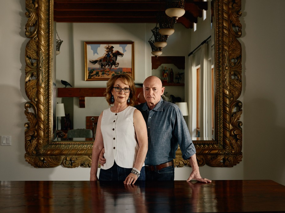 a woman and man stand together