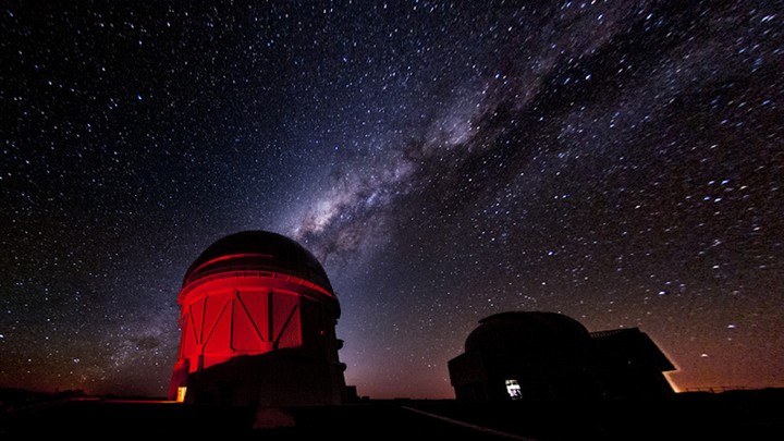 The Victor M. Blanco Telescope in Chile against a starry sky