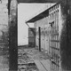 Interior view of a slave pen, showing the doors of cells where the slaves were held before being sold