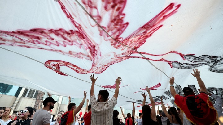 Protesters gather during the Flamingo Revolution in Albania
