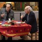 Larry David (right) eating at a restaurant