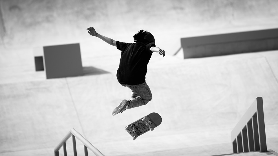 Skateboarder Miyu Sasaki performs a trick at an Olympics venue.