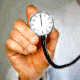 A GIF of a doctor's hand holding up a stethoscope that actually has a ticking clock on its face; the hands are moving around quickly.