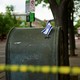 Photo of crime scene with an Israeli flag taped to a mailbox in Boulder, Colorado