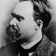 A black and white portrait of Nietzsche