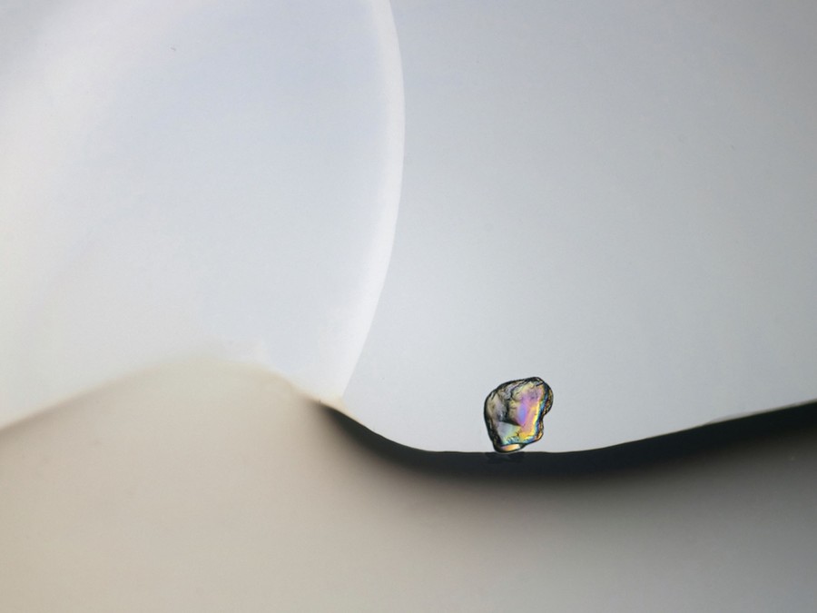 A very close view of a single grain of semi-transparent sand