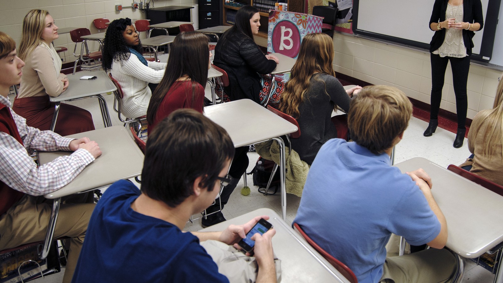 Students can't get off their phones. Schools have had enough.