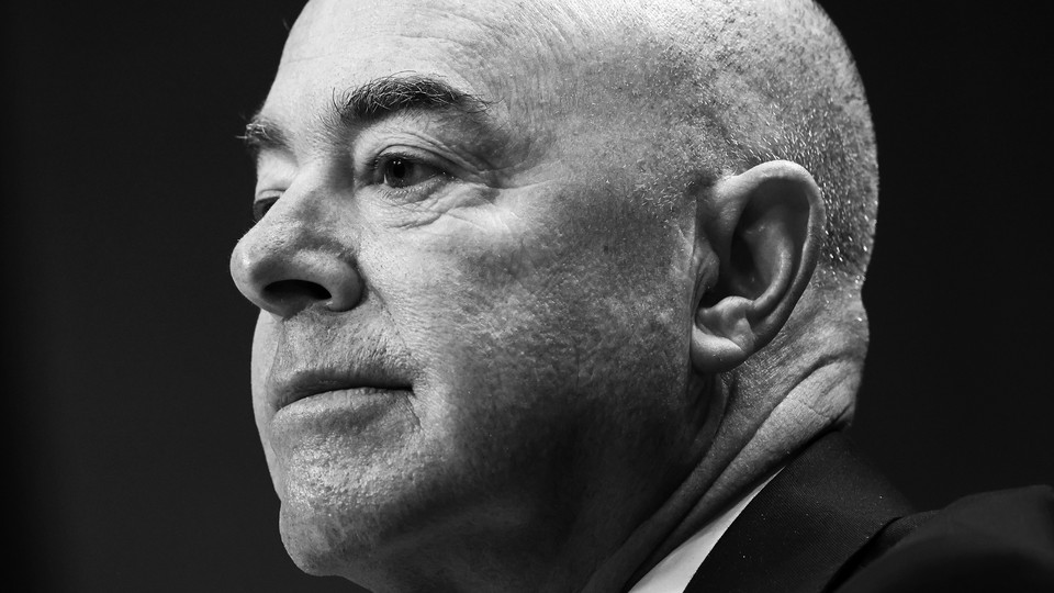 A black-and-white photo of Alejandro Mayorkas